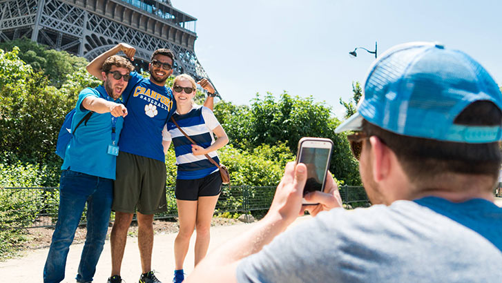 Take your picture at the Eiffel Tower